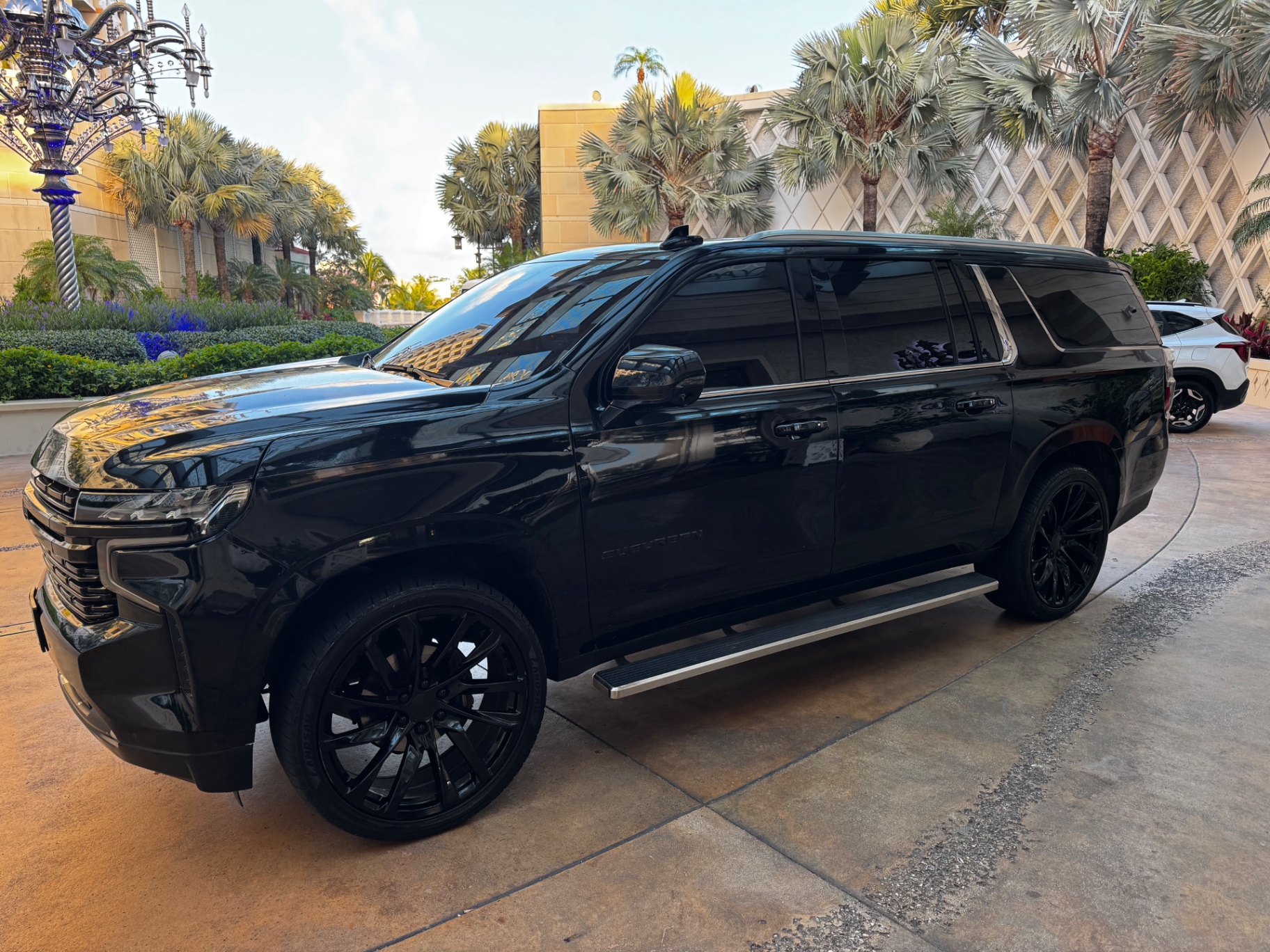 Black 2021 Chevrolet Suburban chauffeur SUV at a luxury Nassau, Bahamas resort